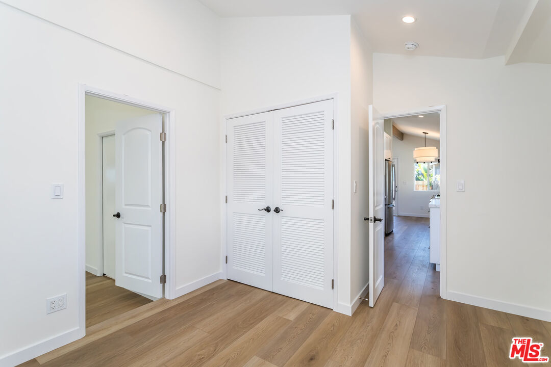 336 Rennie Avenue, Unit C Venice, CA 90291 - Photo 16 of 23 a view of a hallway with wooden floor