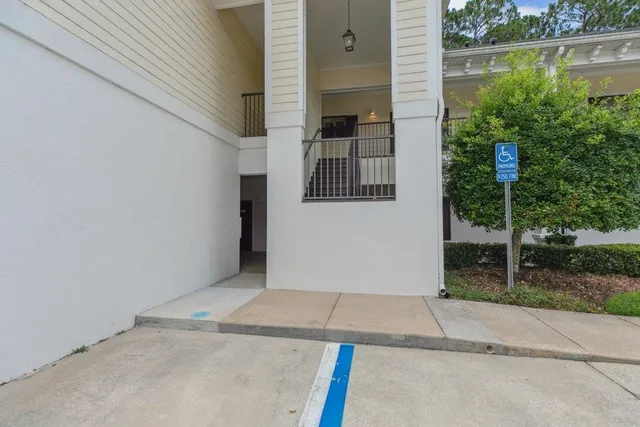 a view of a house with a street