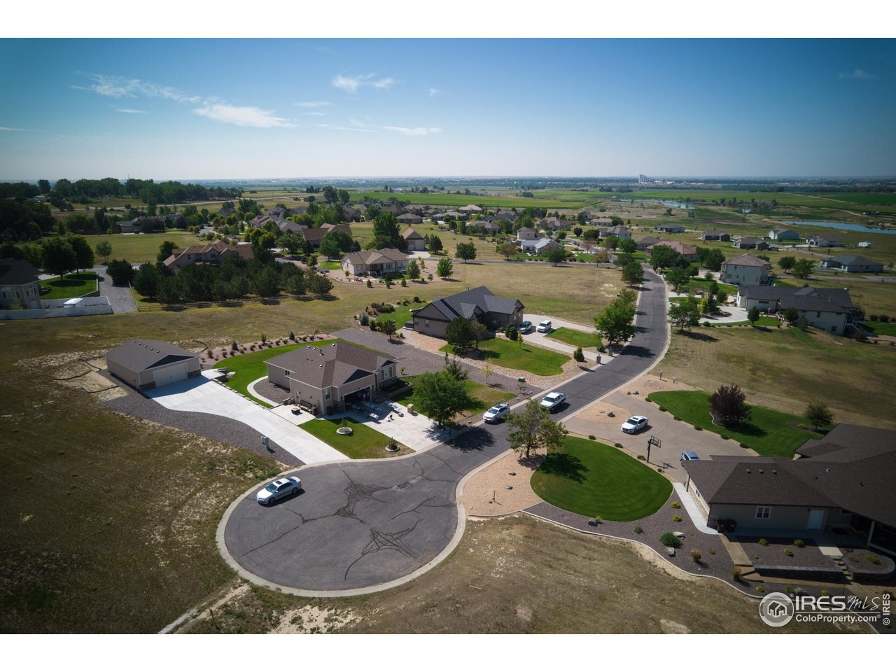 19 Lakeview Circle Fort Morgan, CO 80701 - Photo 4 of 11 an aerial view of residential houses with outdoor space