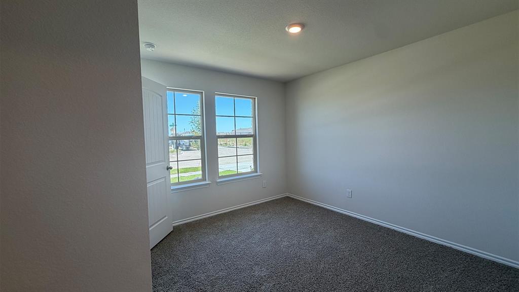 2007 Reveille Way Terrell, TX 75160 - Photo 12 of 31 an empty room with a window