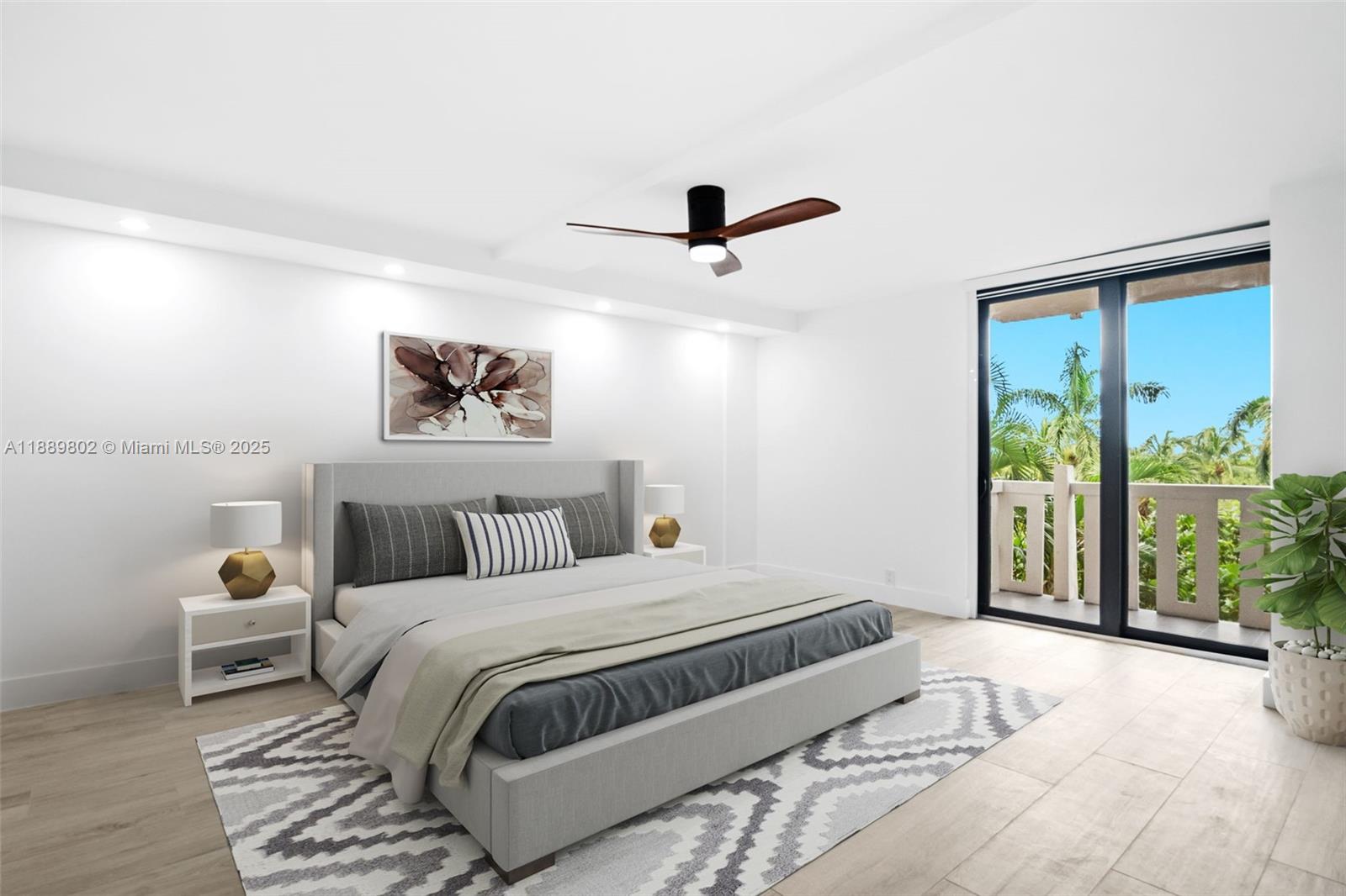 1121 Crandon Boulevard, Unit D304 Key Biscayne, FL 33149 - Photo 4 of 42 a bedroom with a large bed and a window