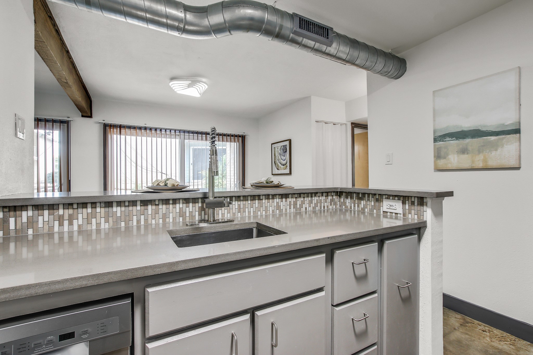 2124 Burton Drive, Unit 164 Austin, TX 78741 - Photo 14 of 37 a bathroom with a sink and a mirror