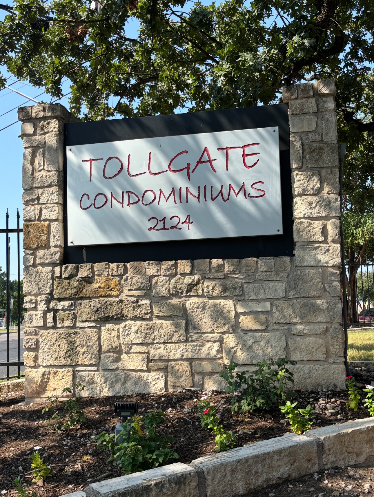 2124 Burton Drive, Unit 164 Austin, TX 78741 - Photo 36 of 37 a sign on the side of a building