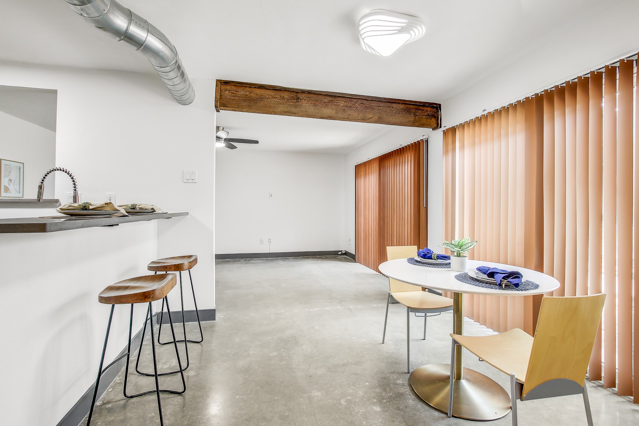 2124 Burton Drive, Unit 164 Austin, TX 78741 - Photo 9 of 37 a dining room with furniture and window