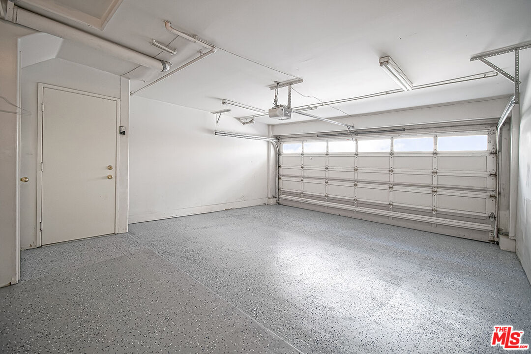 2950 South Bentley Avenue, Unit 3 Los Angeles, CA 90064 - Photo 29 of 32 a view of a garage room