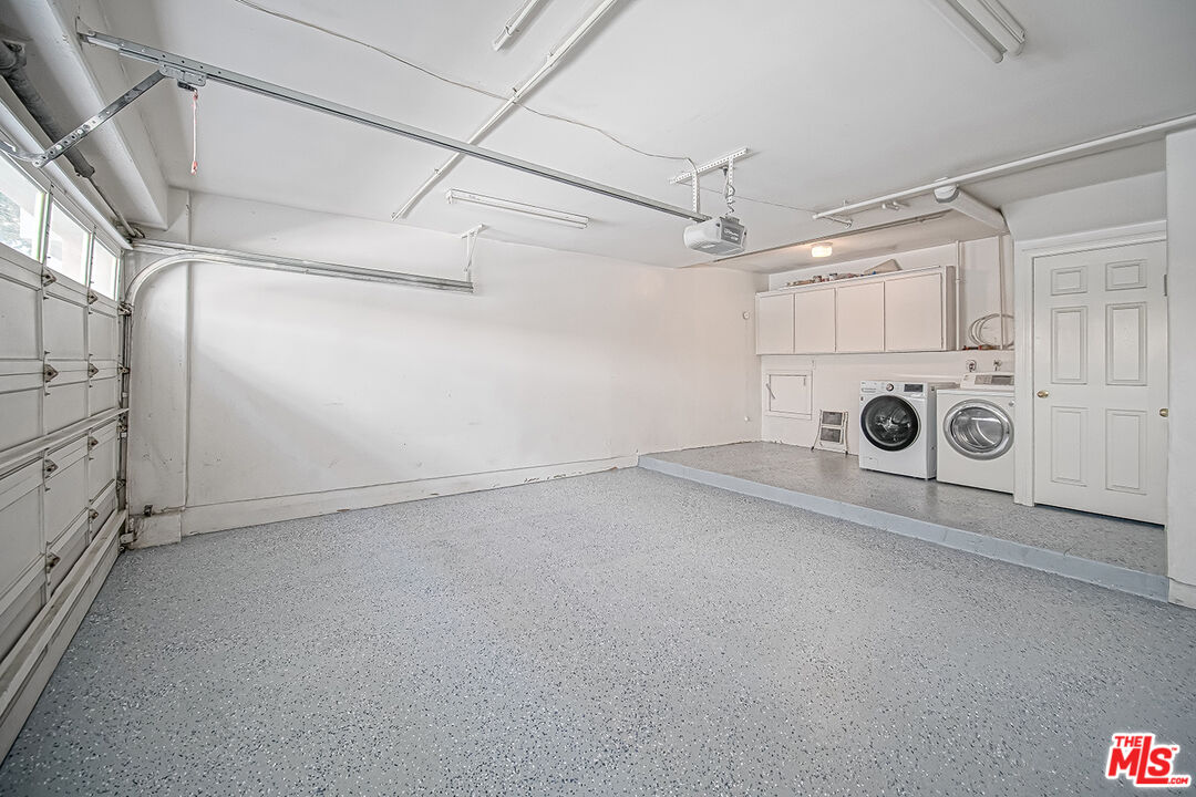 2950 South Bentley Avenue, Unit 3 Los Angeles, CA 90064 - Photo 30 of 32 a view of a storage & utility room with a window