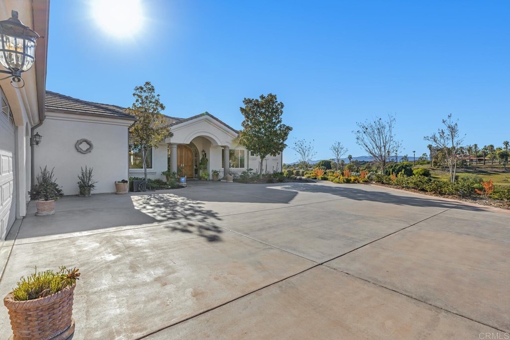 733 Hawks View Way Fallbrook, CA 92028 - Photo 1 of 1 a view of multiple houses with a yard