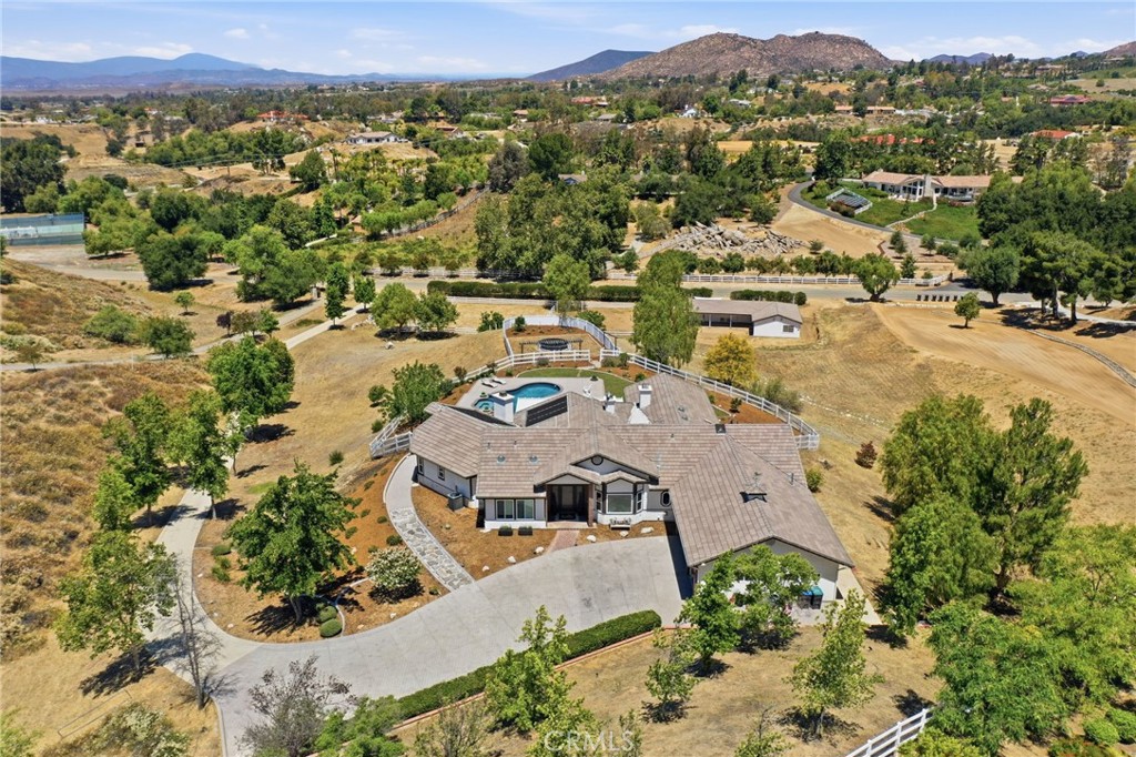 41110 Los Ranchos Circle Temecula, CA 92592 - Photo 74 of 77 an aerial view of residential houses with outdoor space and street view
