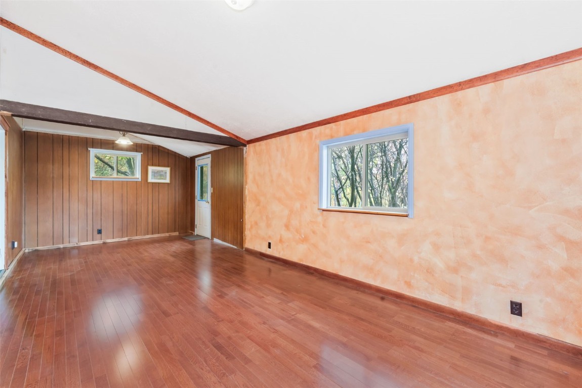 250 South Spruce Street Hayden, CO 81639 - Photo 19 of 46 a view of an empty room with wooden floor and a window