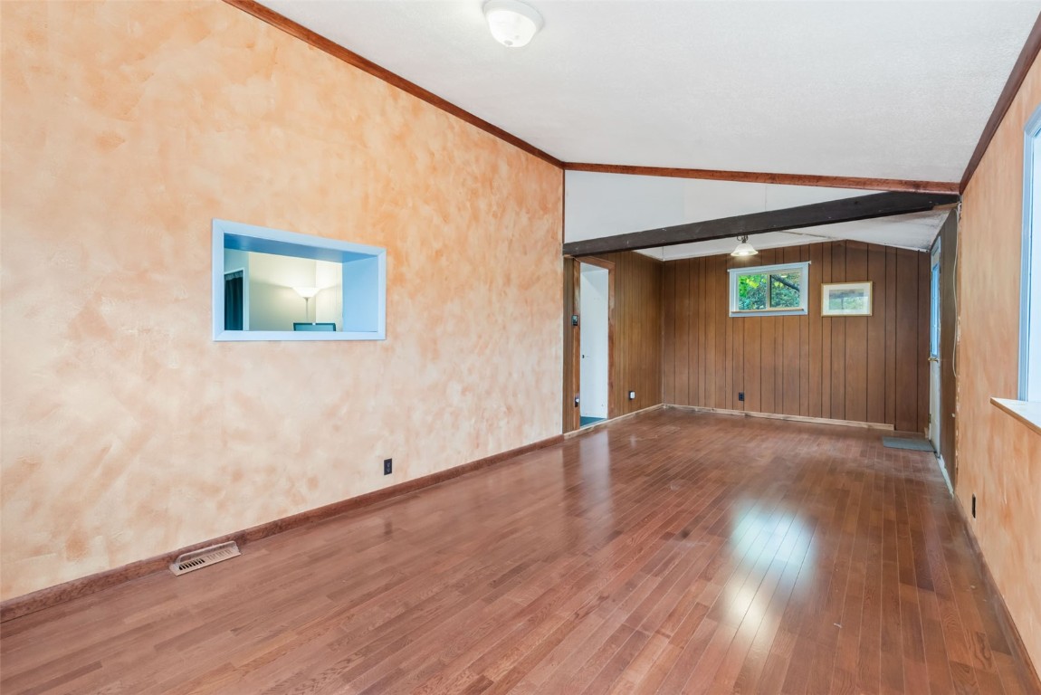 250 South Spruce Street Hayden, CO 81639 - Photo 20 of 46 a view of an empty room with wooden floor and a window