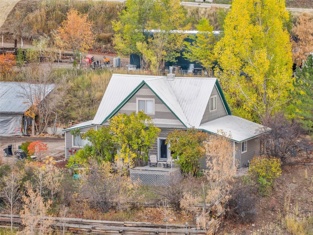 250 South Spruce Street Hayden, CO 81639 - Photo 2 of 46 a view of a house with yard and sitting area