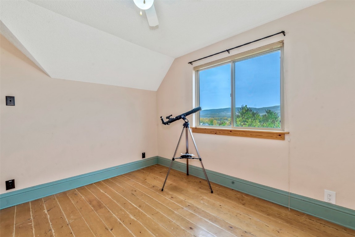 250 South Spruce Street Hayden, CO 81639 - Photo 32 of 46 a room with wooden floor and window