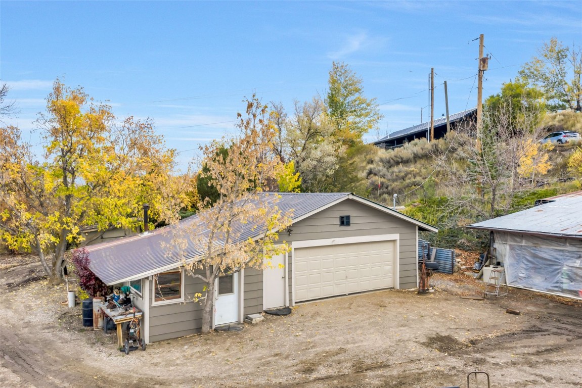 250 South Spruce Street Hayden, CO 81639 - Photo 40 of 46 a view of a house with a yard