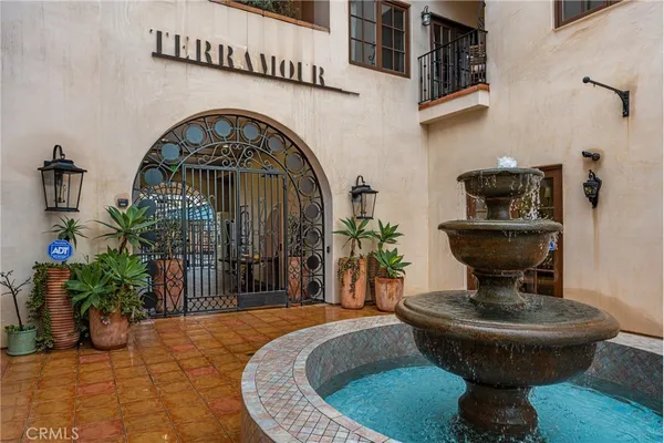 a view of a lobby with a fountain