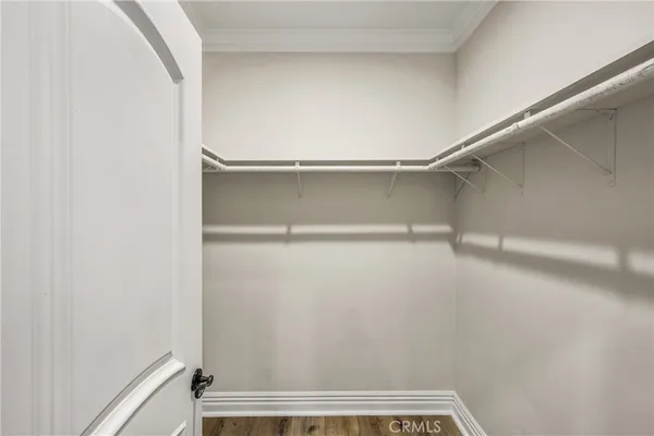a view of an empty walk in closet