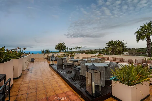 a view of a terrace with sitting area