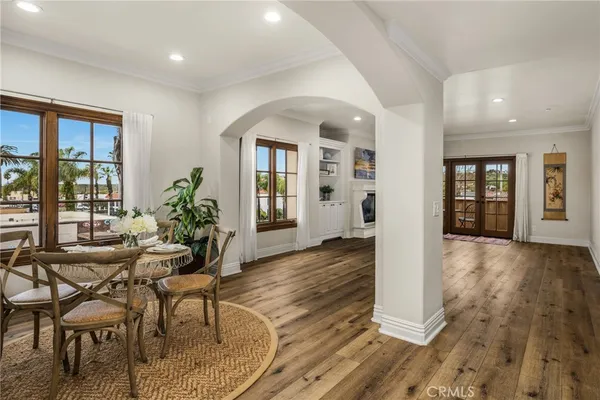 a view of a livingroom with furniture and hardwood floor