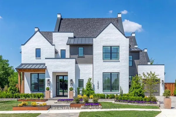 front view of a house with a yard