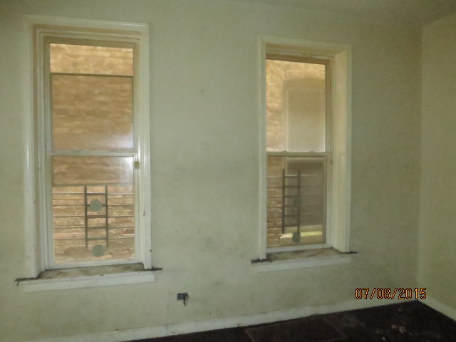 6006 South Carpenter Street Chicago, IL 60621 - Photo 3 of 15 a view of front door of house