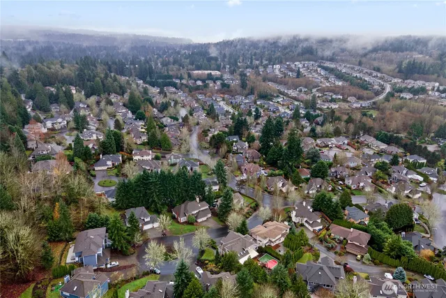 an aerial view of a city with lots of residential buildings