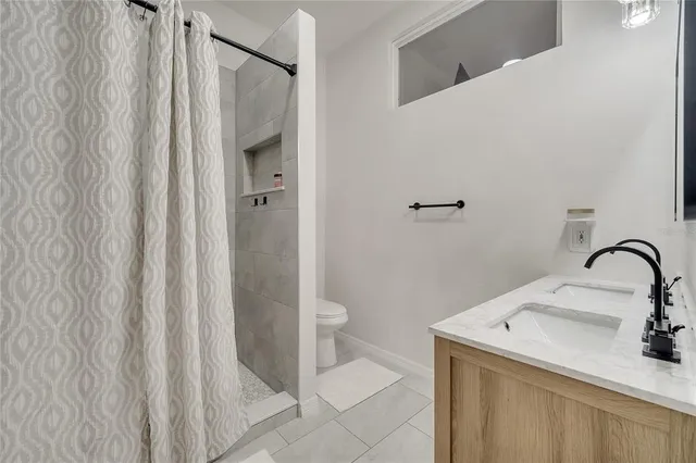 a view of a livingroom with a hall and an entryway