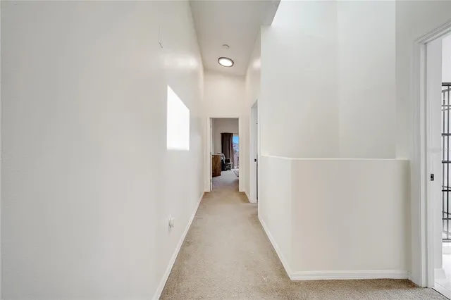 a view of swimming pool with outdoor seating and plants