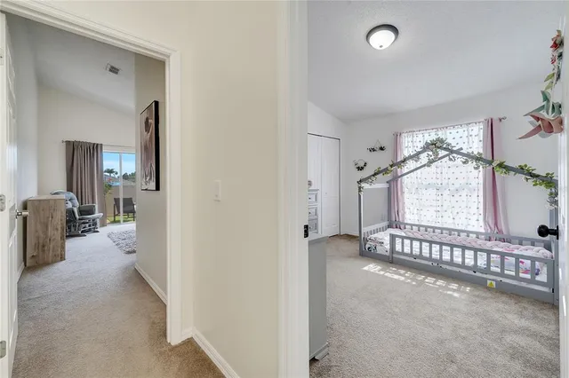 a view of a chairs and table in a balcony
