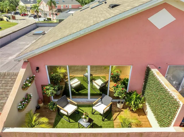 a bathroom with a toilet a sink and a window