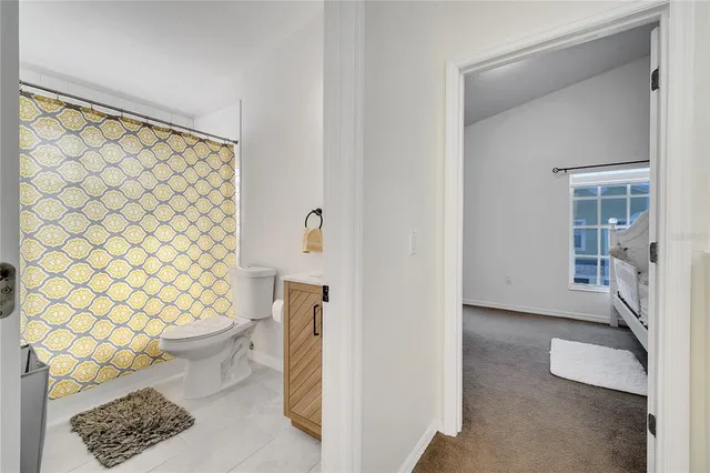 a view of a swimming pool with a lounge chair