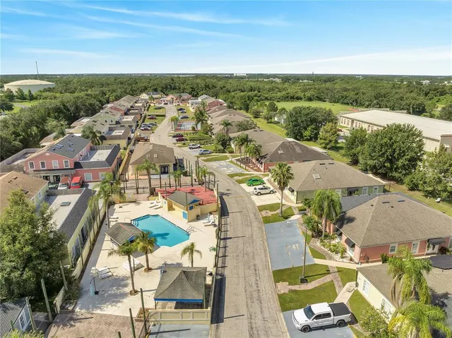 an aerial view of a house with a garden
