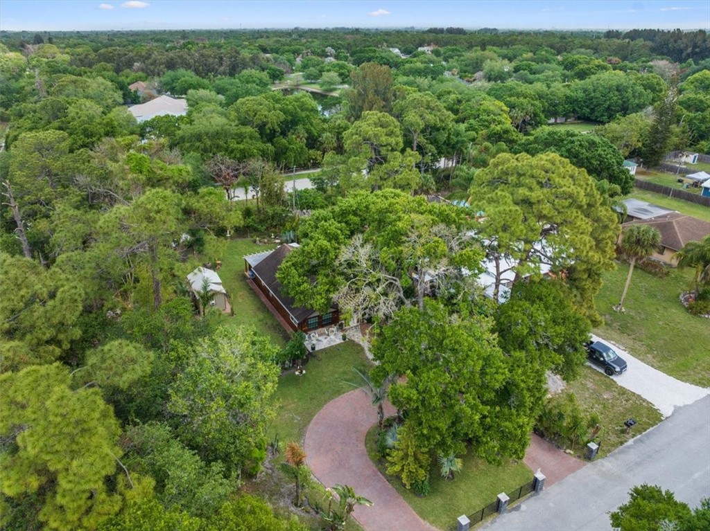3496 3rd Place Vero Beach, FL 32968 - Photo 36 of 36 an aerial view of a house with a yard