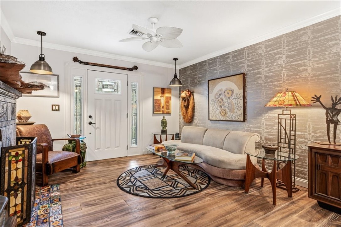 3496 3rd Place Vero Beach, FL 32968 - Photo 6 of 36 a living room with furniture or couch and a wooden floor