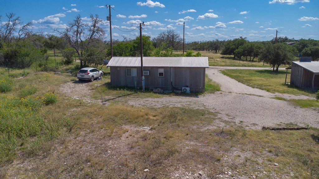 412 Sky Harbor Rd Mountain Mountain Home, TX 78058 - Photo 2 of 16 a view of a big yard