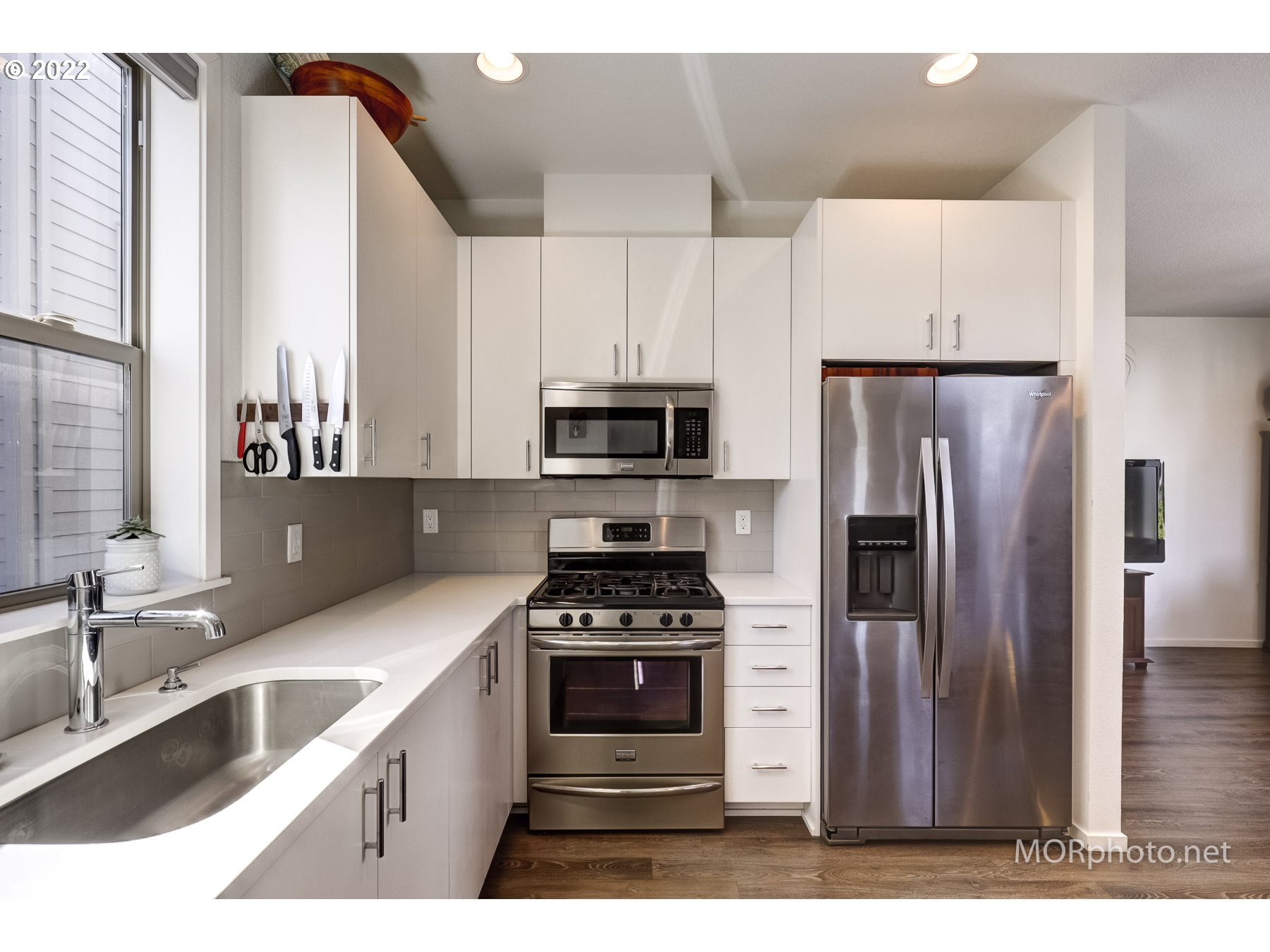 1208 North Morgan Street Portland, OR 97217 - Photo 14 of 23 a kitchen with a refrigerator sink and stove