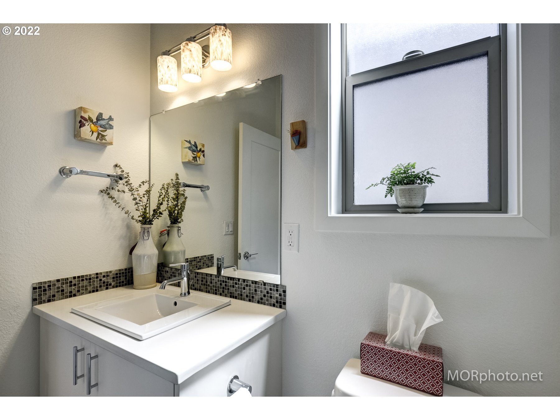 1208 North Morgan Street Portland, OR 97217 - Photo 15 of 23 a bathroom with a sink vanity and mirror