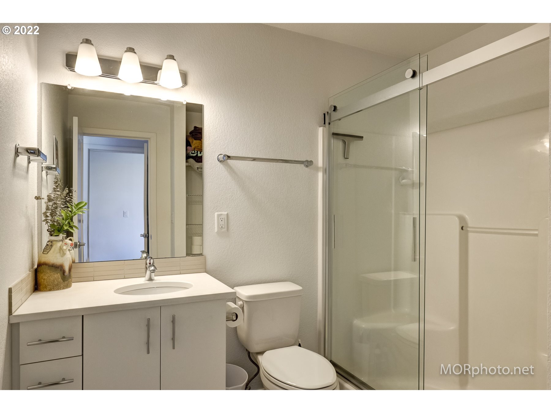 1208 North Morgan Street Portland, OR 97217 - Photo 18 of 23 a bathroom with a sink shower and a mirror