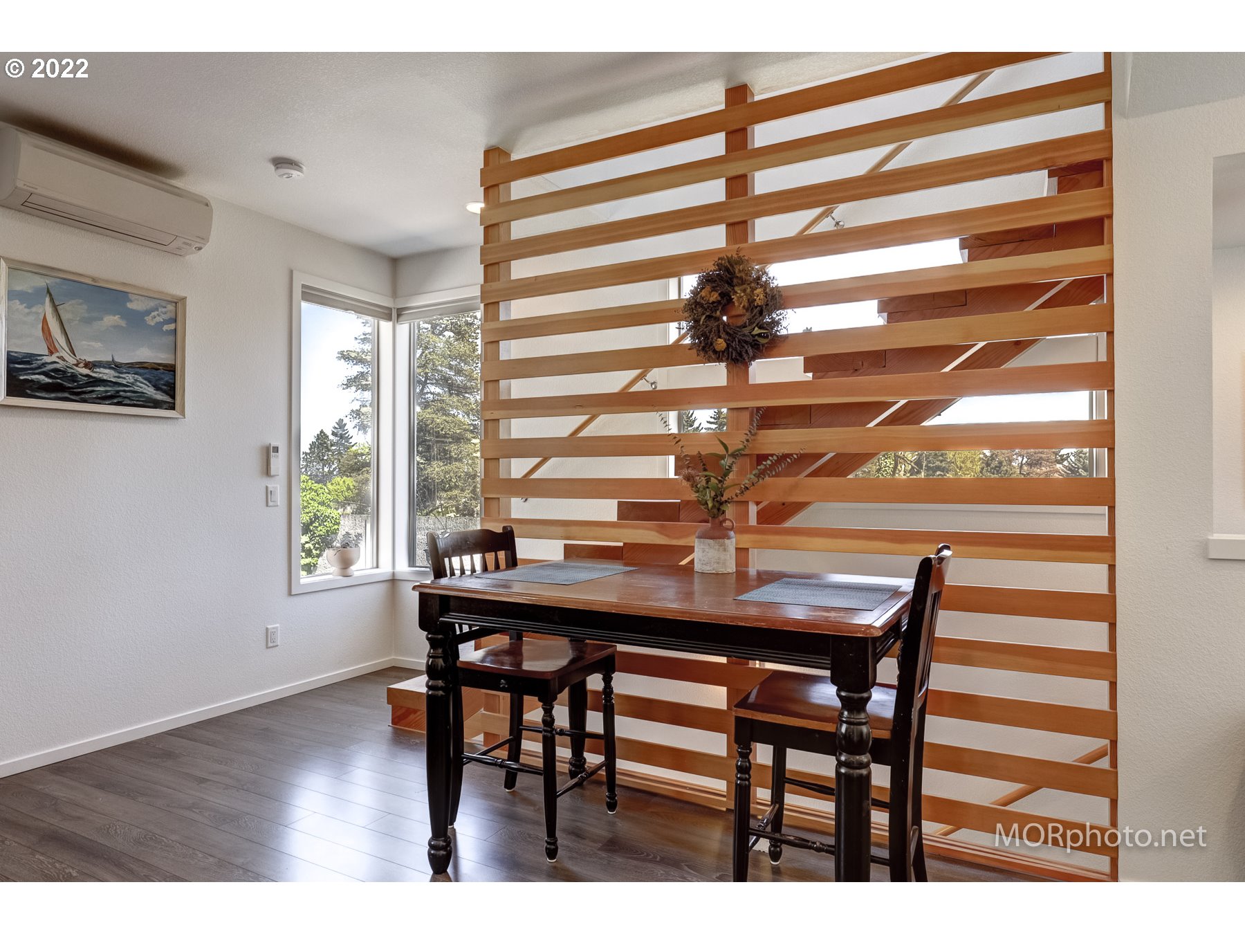 1208 North Morgan Street Portland, OR 97217 - Photo 6 of 23 a view of a dining room with furniture and window
