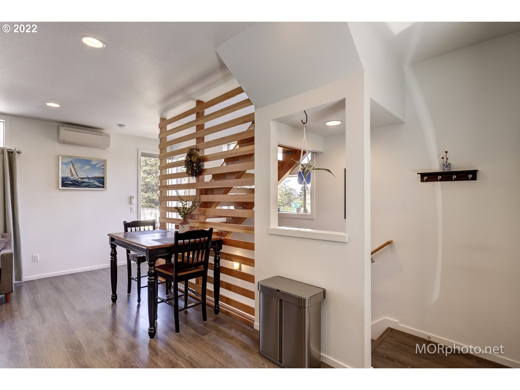 1208 North Morgan Street Portland, OR 97217 - Photo 8 of 23 a view of a dining room with furniture and chandelier