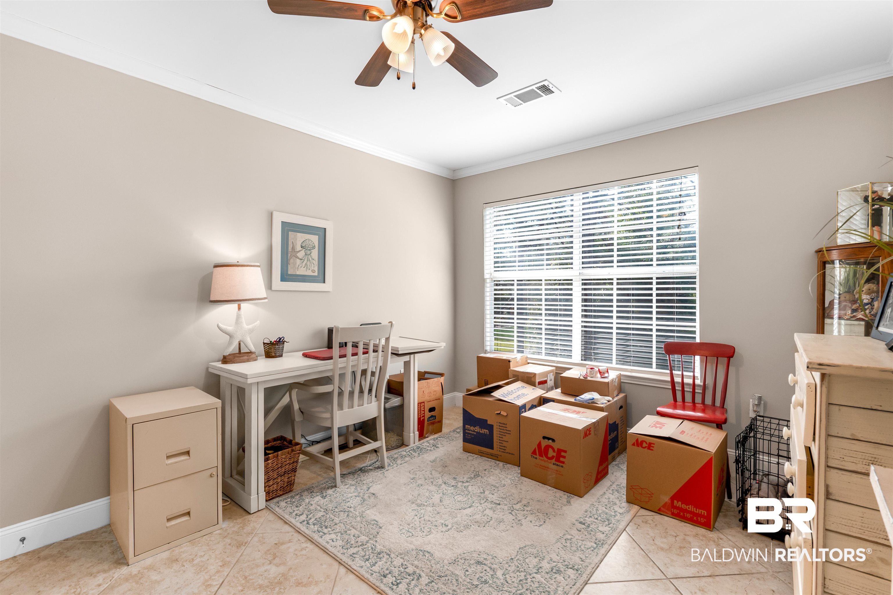 1517 Regency Road, Unit 68 Gulf Shores, AL 36542 - Photo 26 of 43 Tiled office featuring ceiling fan and ornamental molding