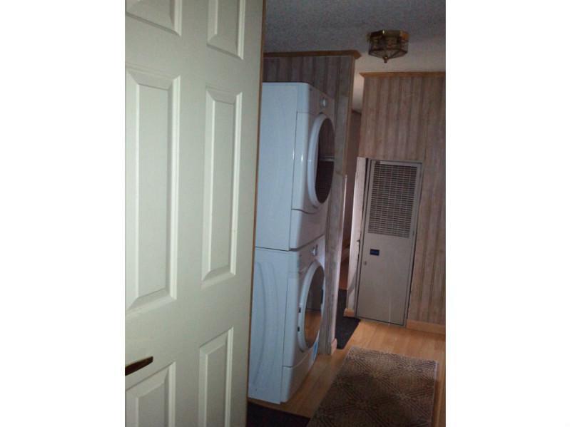 4 Libby Street Medway, ME 04460 - Photo 17 of 21 Other. Hallway washer/dryer.