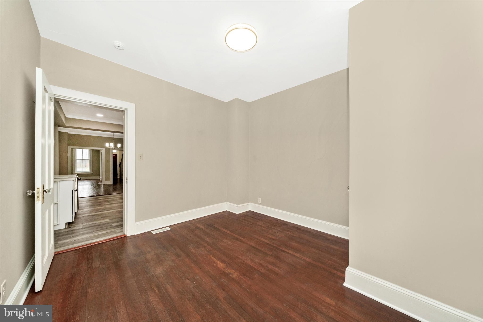 129 West 4th Street Frederick, MD 21701 - Photo 28 of 70 a view of a room with wooden floor