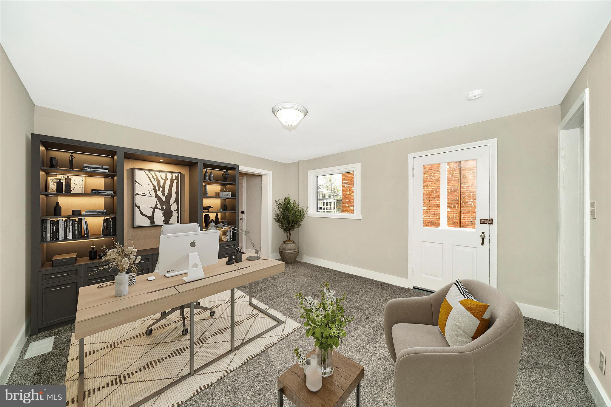 129 West 4th Street Frederick, MD 21701 - Photo 31 of 70 a living room with furniture fireplace and window