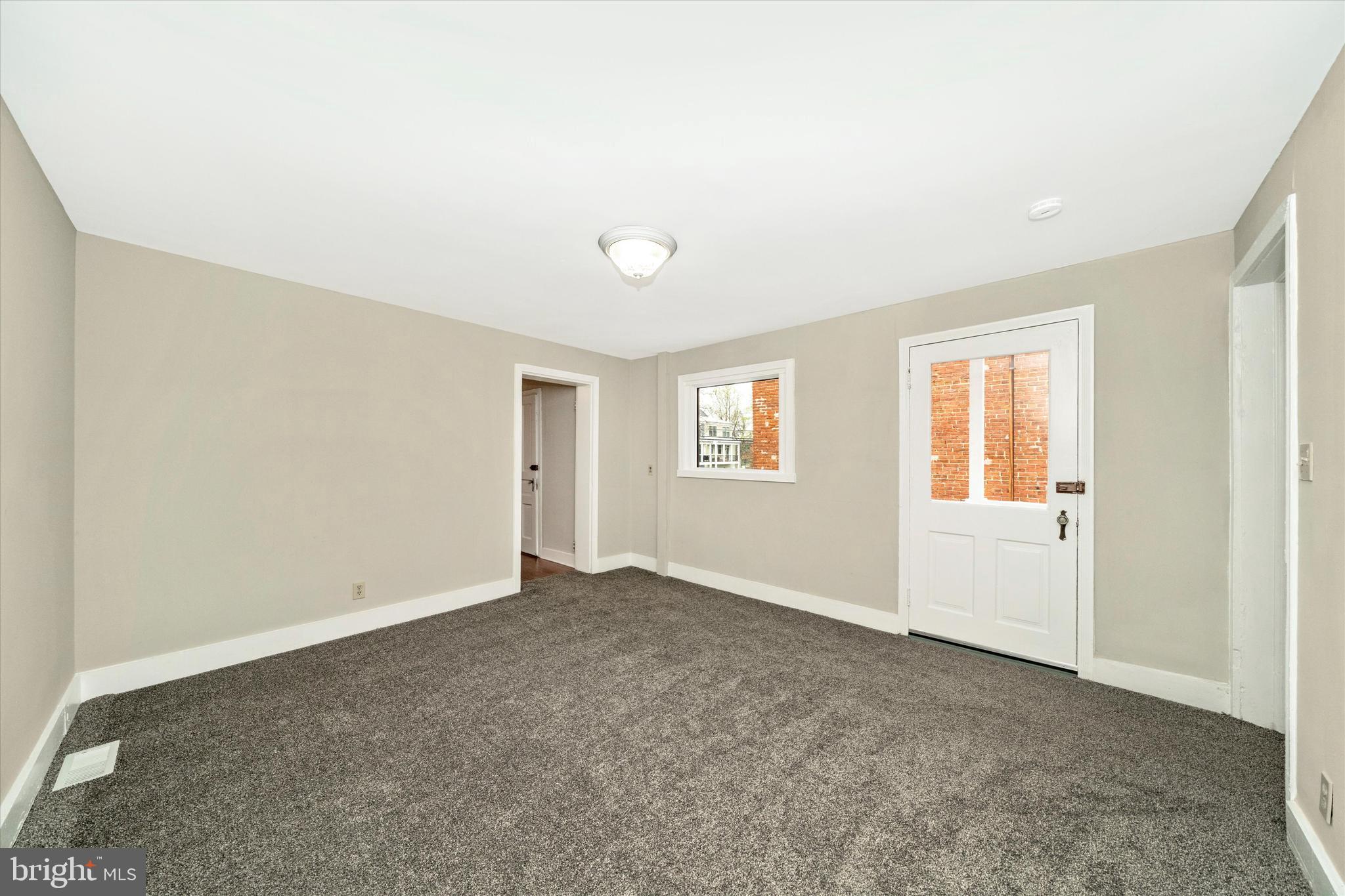 129 West 4th Street Frederick, MD 21701 - Photo 33 of 70 an empty room with windows