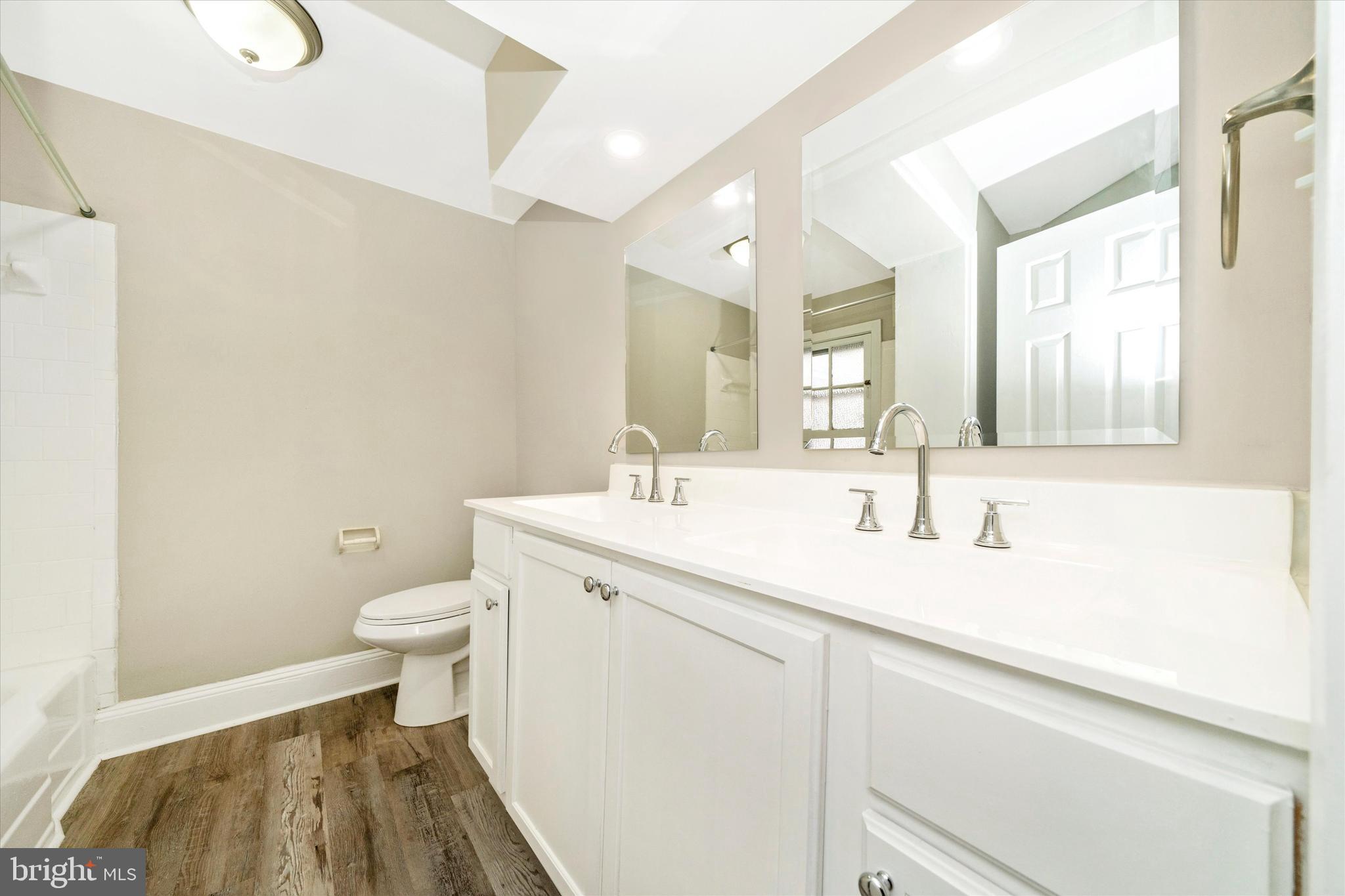 129 West 4th Street Frederick, MD 21701 - Photo 41 of 70 a bathroom with a sink and a toilet