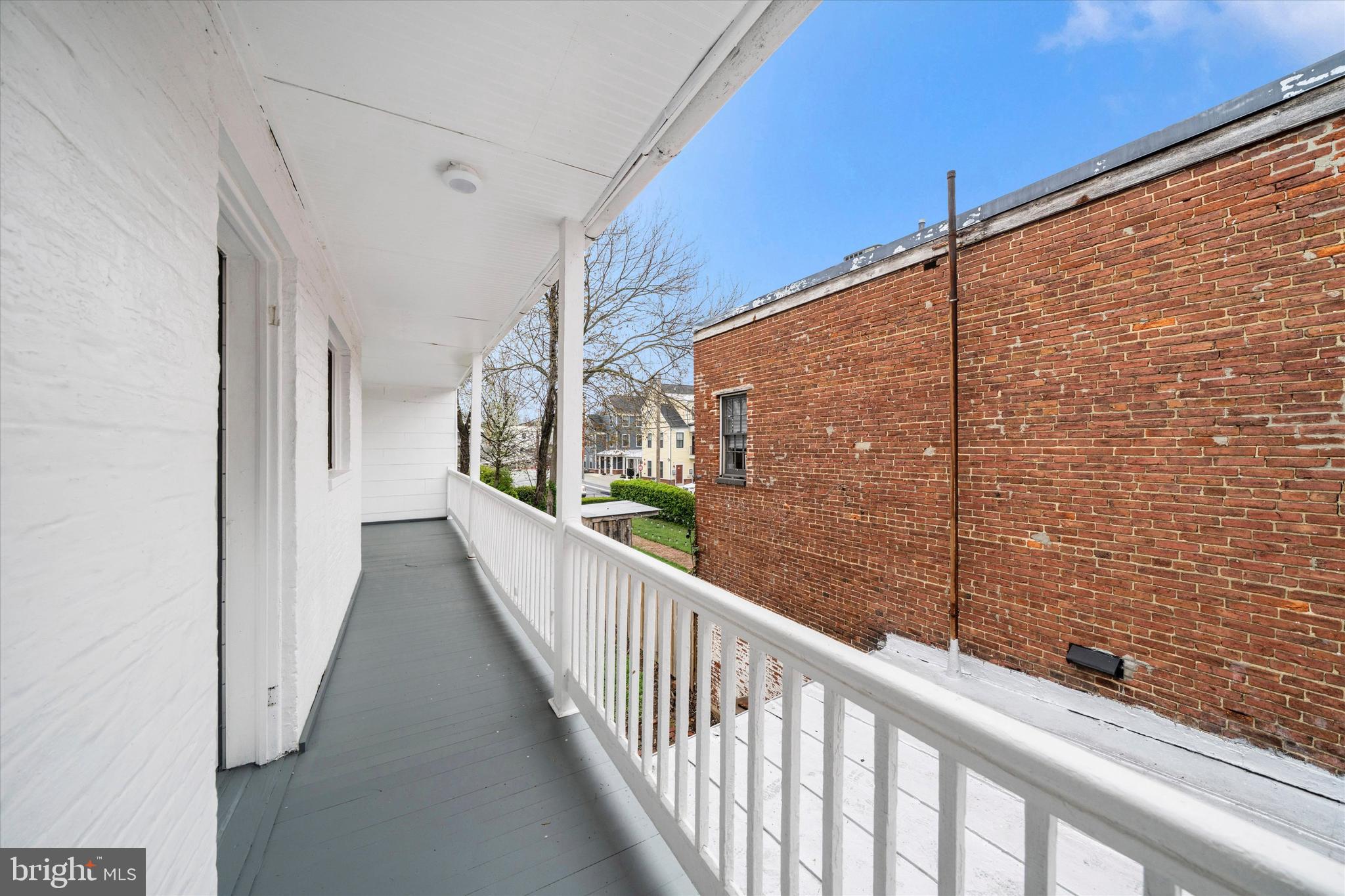 129 West 4th Street Frederick, MD 21701 - Photo 54 of 70 a view of a balcony with wooden floor