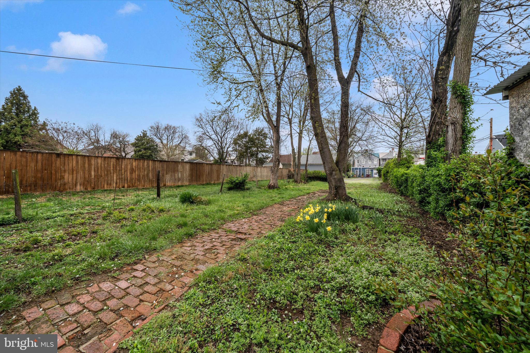 129 West 4th Street Frederick, MD 21701 - Photo 60 of 70 a backyard of a house with lots of green space and lake view