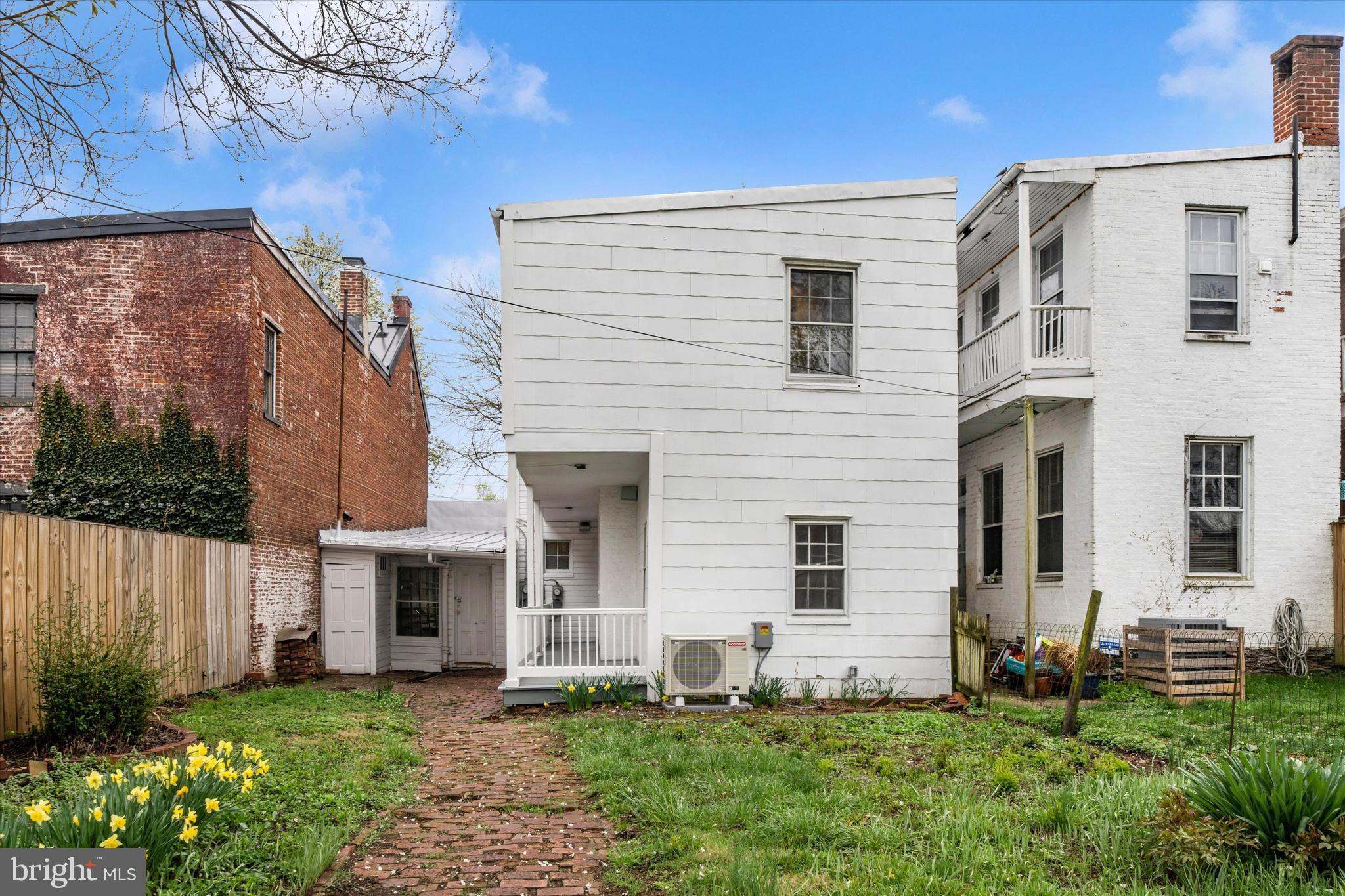 129 West 4th Street Frederick, MD 21701 - Photo 61 of 70 a view of a house with a yard and a table and chairs