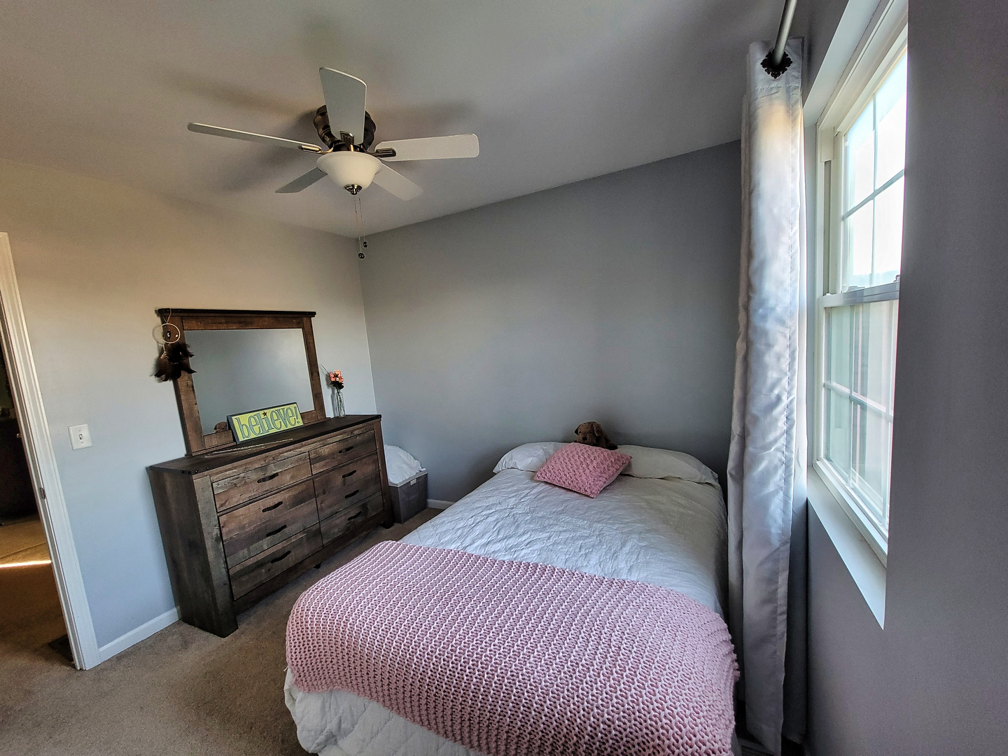 292 South Will Road Diamond, IL 60416 - Photo 12 of 19 a bedroom with a bed and a dresser