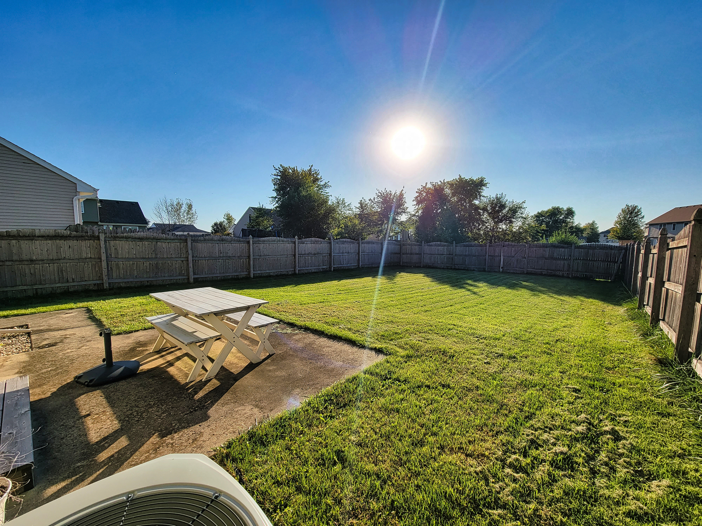 292 South Will Road Diamond, IL 60416 - Photo 18 of 19 a view of a swimming pool with a yard