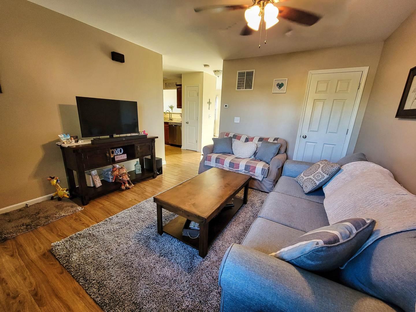 292 South Will Road Diamond, IL 60416 - Photo 3 of 19 a living room with furniture and a flat screen tv